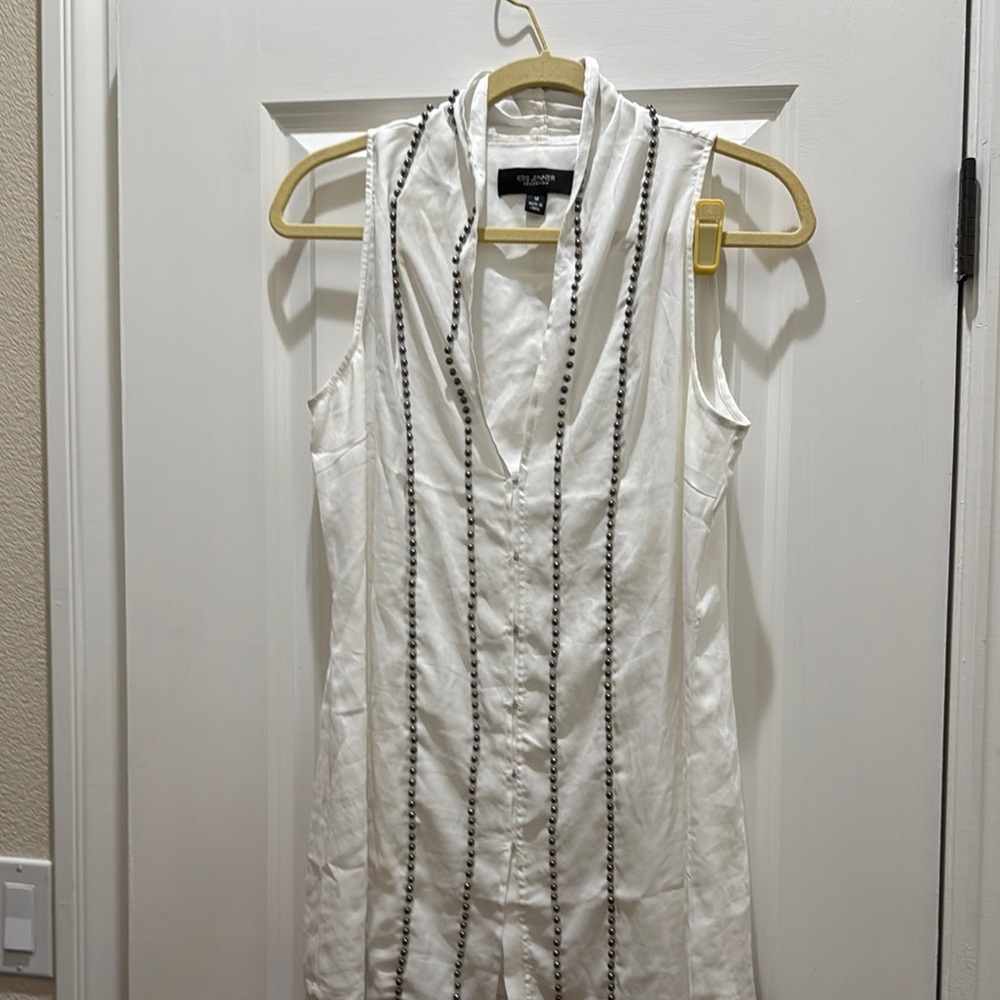 White Sleeveless Blouse